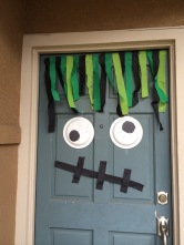 Hide your weather beaten front door behind a Door Monster this Halloween!