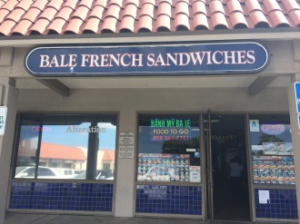 The lovely mom, showcasing the Bale French Sandwich shop.